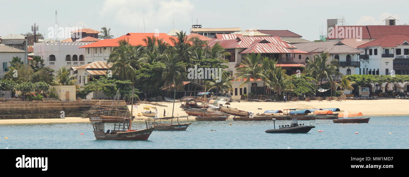 Beach with boats on the island of Zanzibar Stock Photo