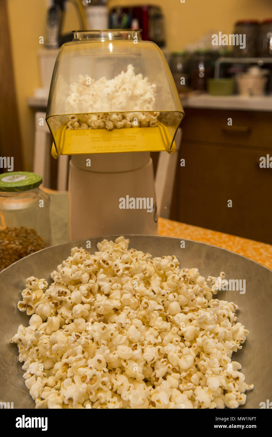 Making popcorn with an electric popper at home Stock Photo Alamy