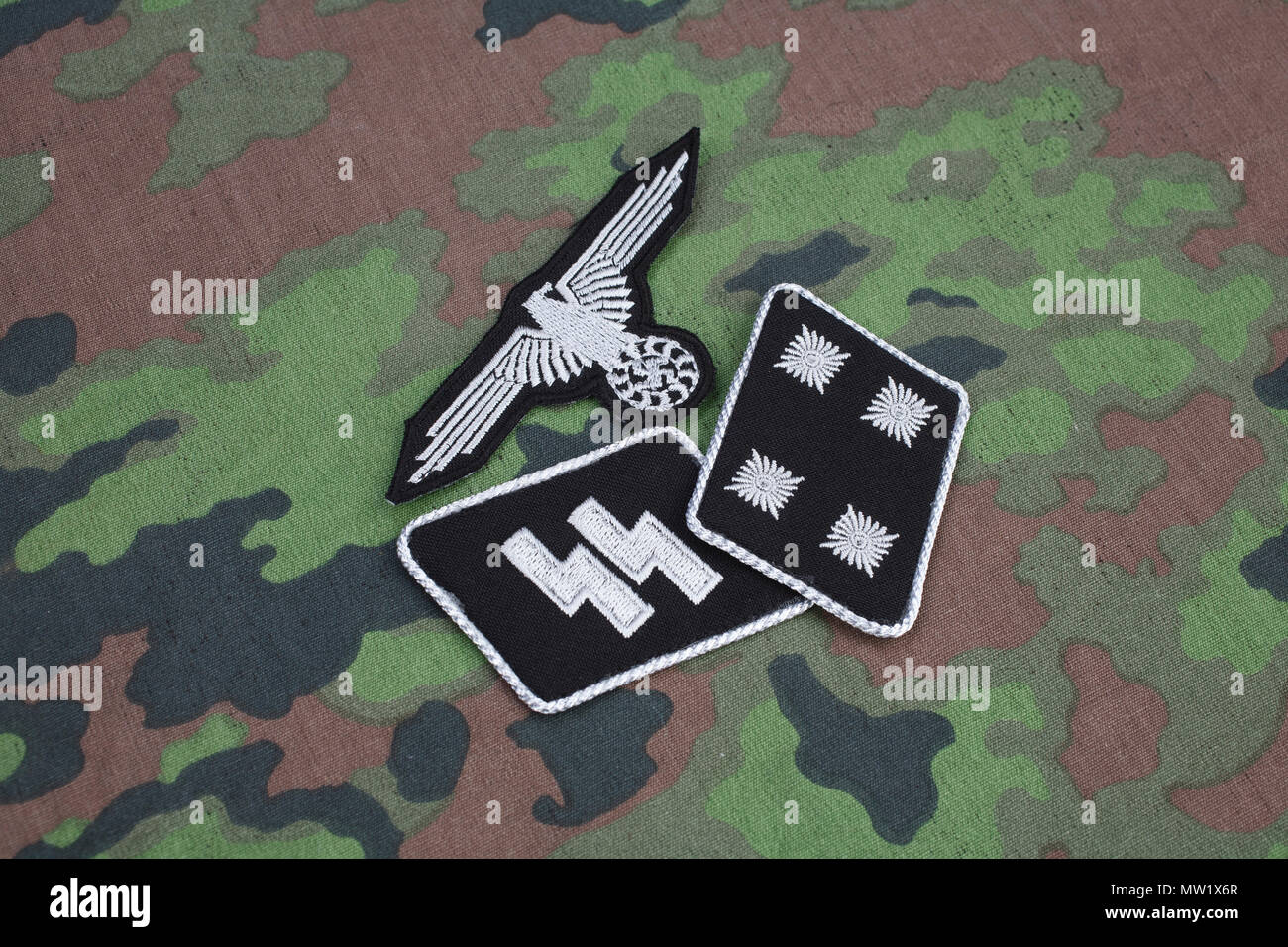WW2 German Waffen-SS military insignia on SS camouflage uniform Stock Photo
