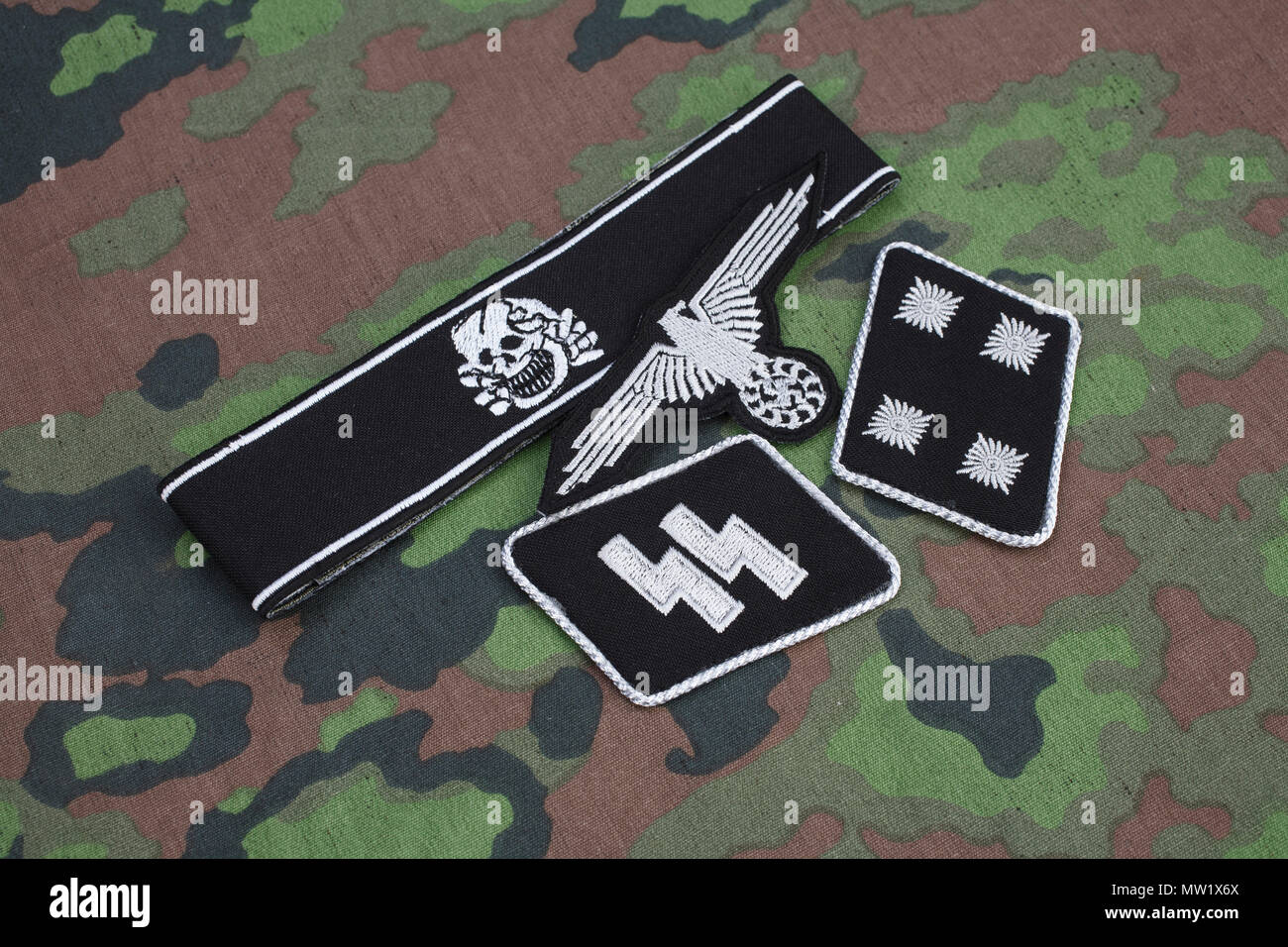 WW2 German Waffen-SS military insignia on SS camouflage uniform Stock Photo