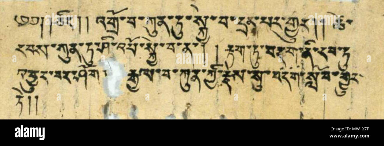 . Deutsch: Tibetische Seite eines zweisprachigen, mongolisch-tibetischen Textfragments, welches in Turfan gefunden wurde. Abmessungen des Textbereichs etwa 15×4,5 cm. English: Tibetan side of a bilingual Mongolian-Tibetan text fragment found at Turfan. Dimensions of the text area about 15×4,5 cm. circa Tang dynasty (618-907). Unknown 617 Turfan fragment tibt Stock Photo