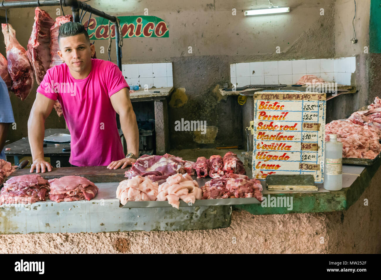 Fresh meat for sale by private butcher at the Mercado Industrial in Cienfuegos, Cuba. Stock Photo