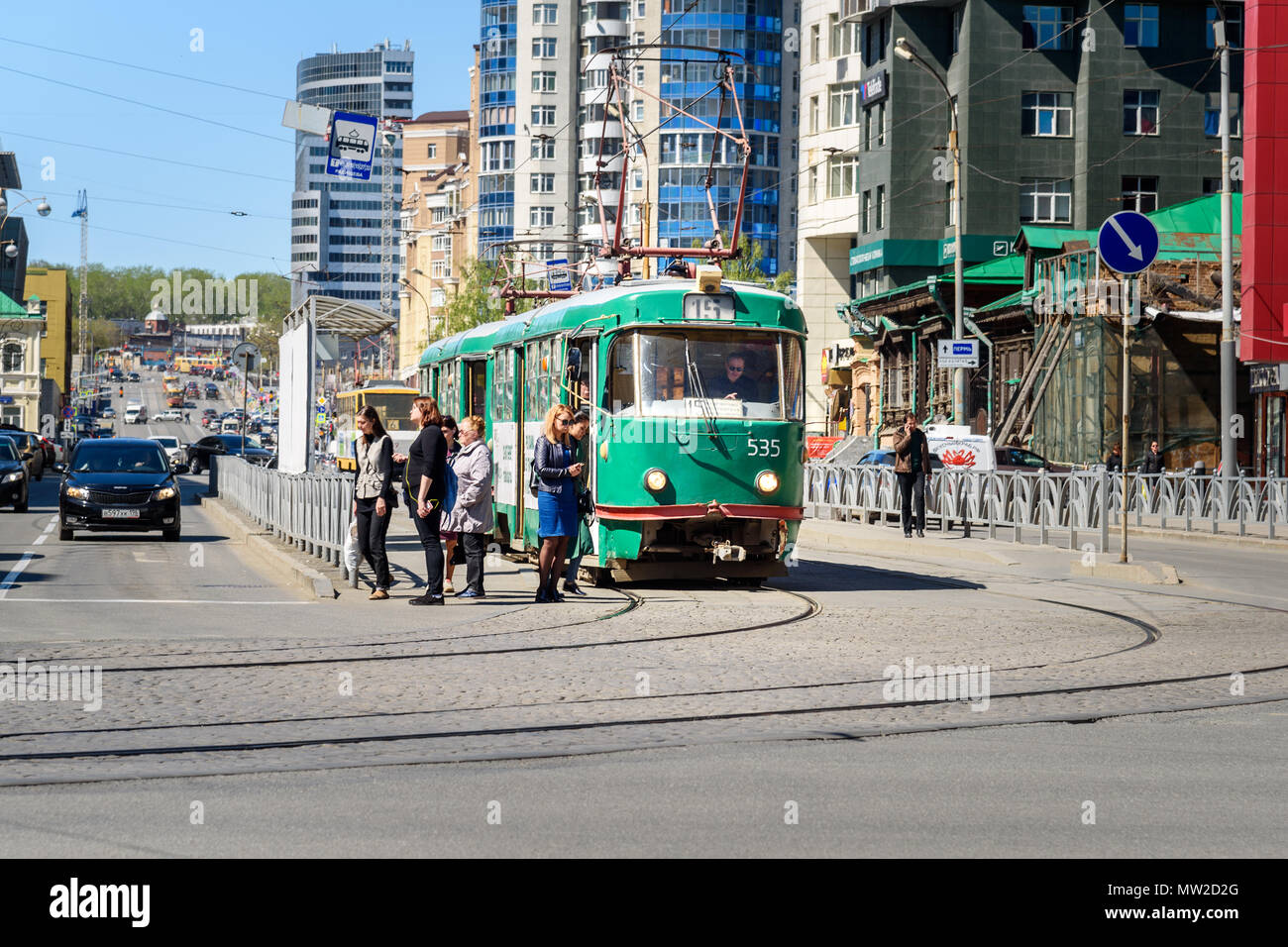 Yekaterinburg, Russia - May 23, 2018: Green tram on tramway stop on the street Stock Photo