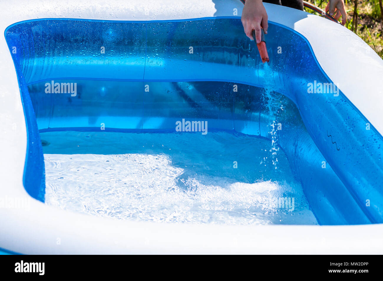 Young boy child playing filling hires stock photography and images Alamy