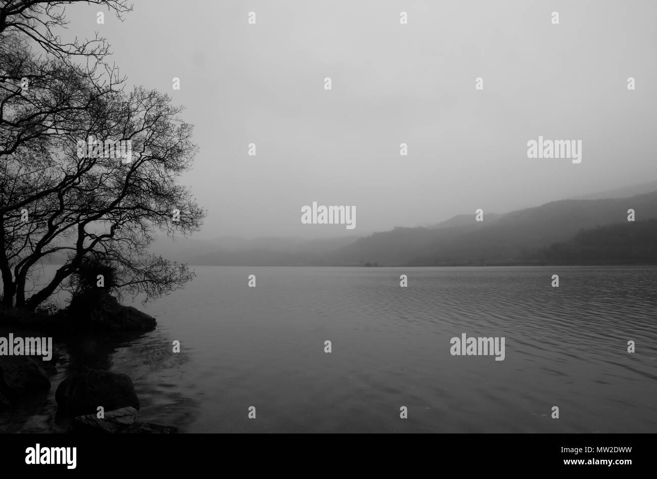 Llyn Dinas lake near Beddgelert in Snowdonia, Gwynedd, Wales, UK Stock Photo