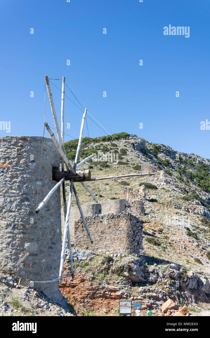 Old stone windmills at entrance to Lasithi Plateau, Kriti (Crete), Greece Stock Photo