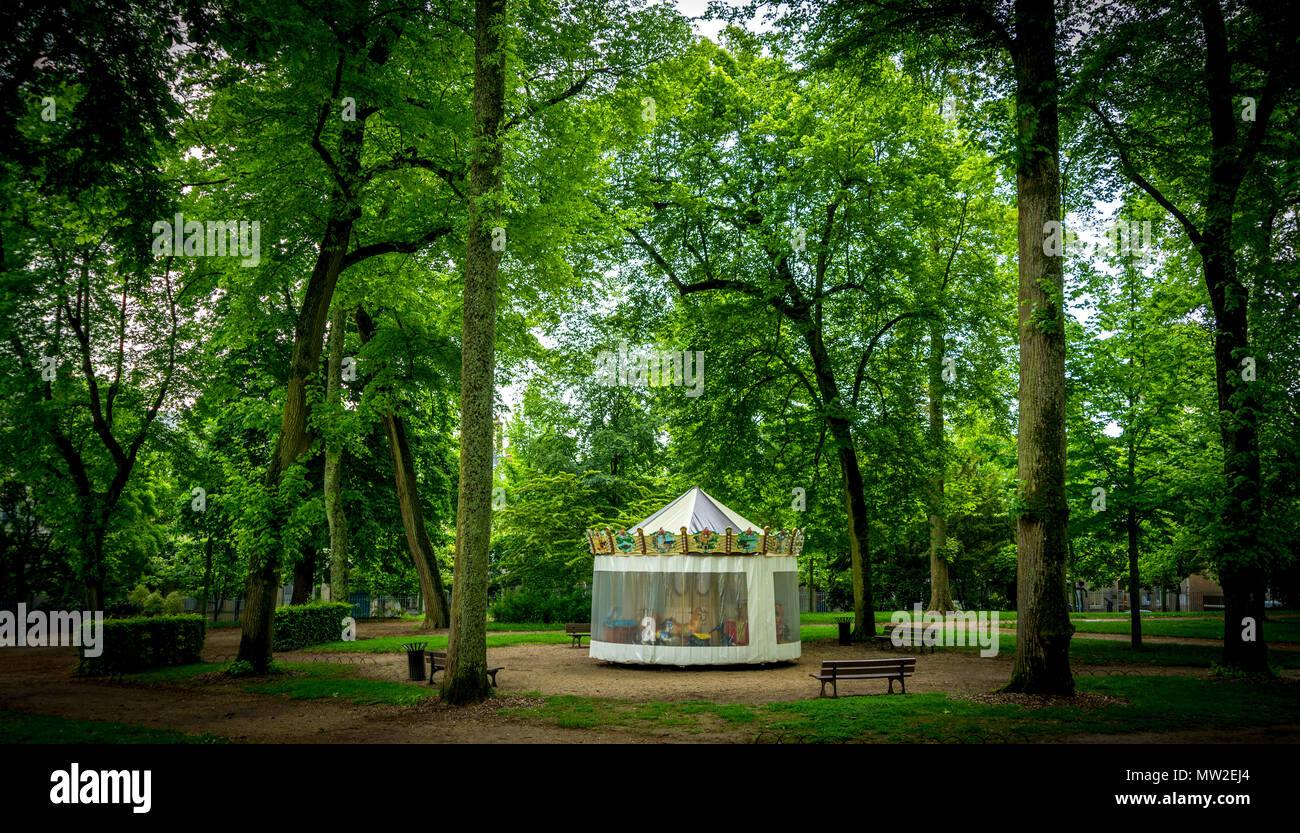 Covered carousel in a park , France Stock Photo - Alamy