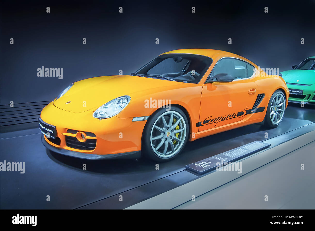 STUTTGART, GERMANY-APRIL 7, 2017: Orange 2008 Porsche Cayman S Sport in the Porsche Museum Stock Photo