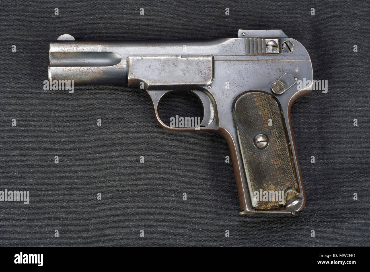 Old rusty handgun on black background Stock Photo - Alamy