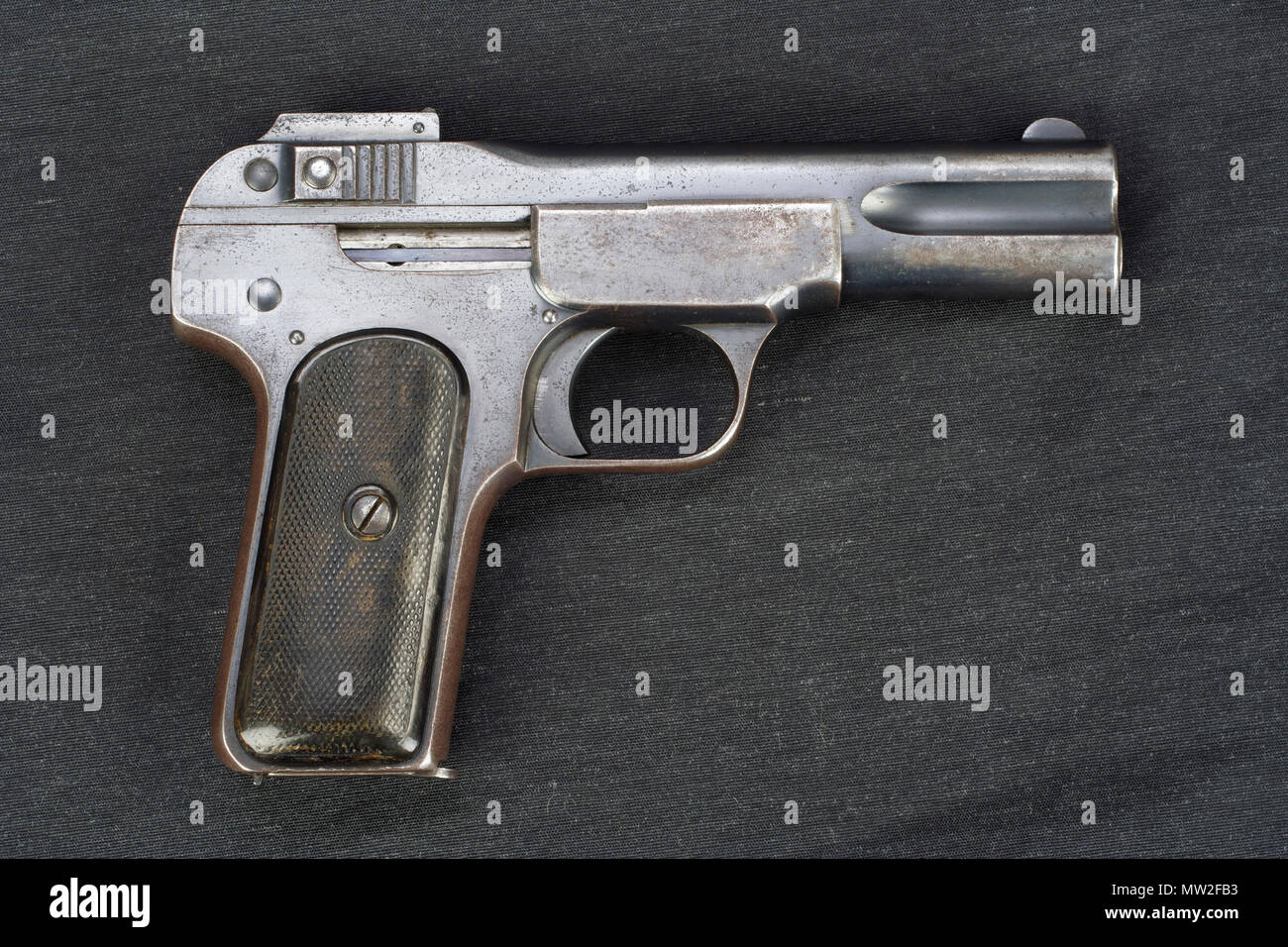Old rusty handgun on black background Stock Photo - Alamy