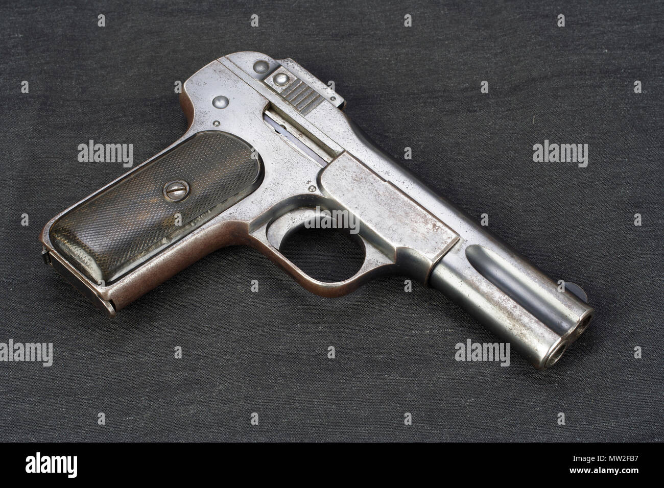 Old rusty handgun on black background Stock Photo - Alamy