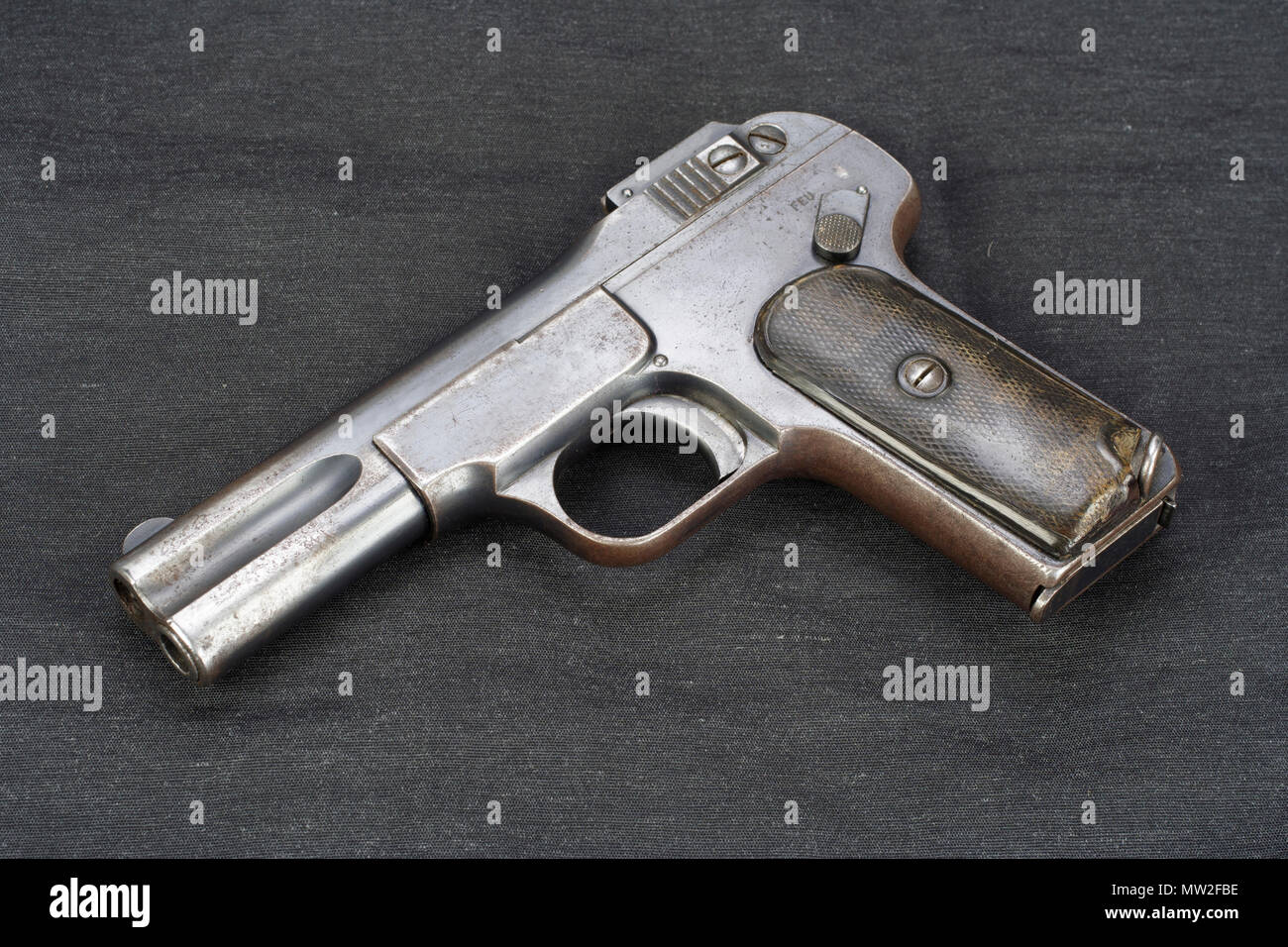 Old rusty handgun on black background Stock Photo - Alamy