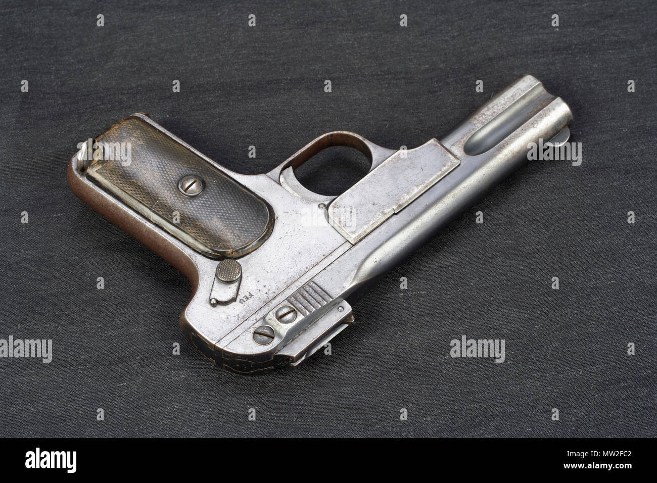Old rusty handgun on black background Stock Photo - Alamy