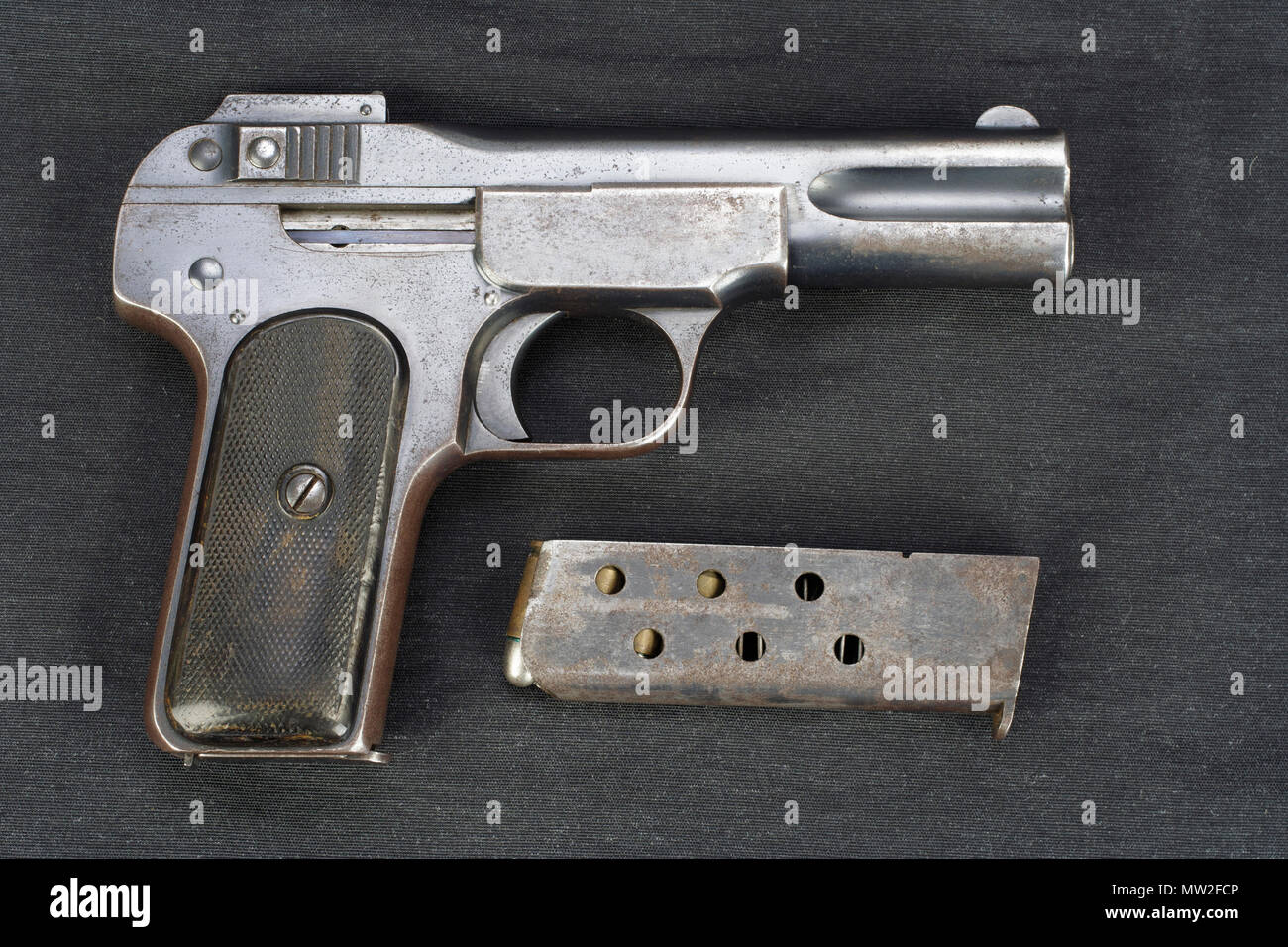 Old rusty handgun on black background Stock Photo - Alamy