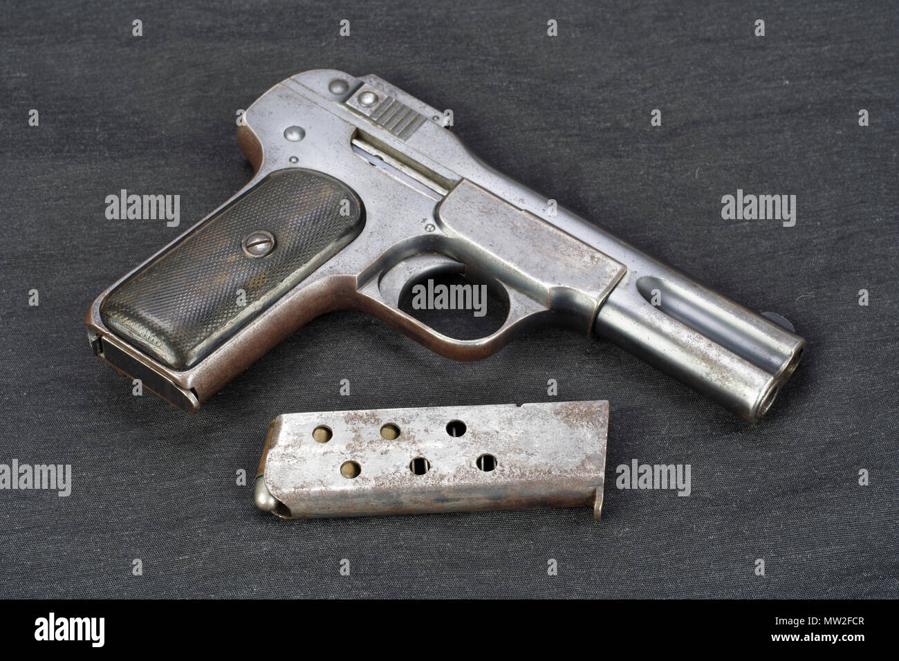 Old rusty handgun on black background Stock Photo - Alamy