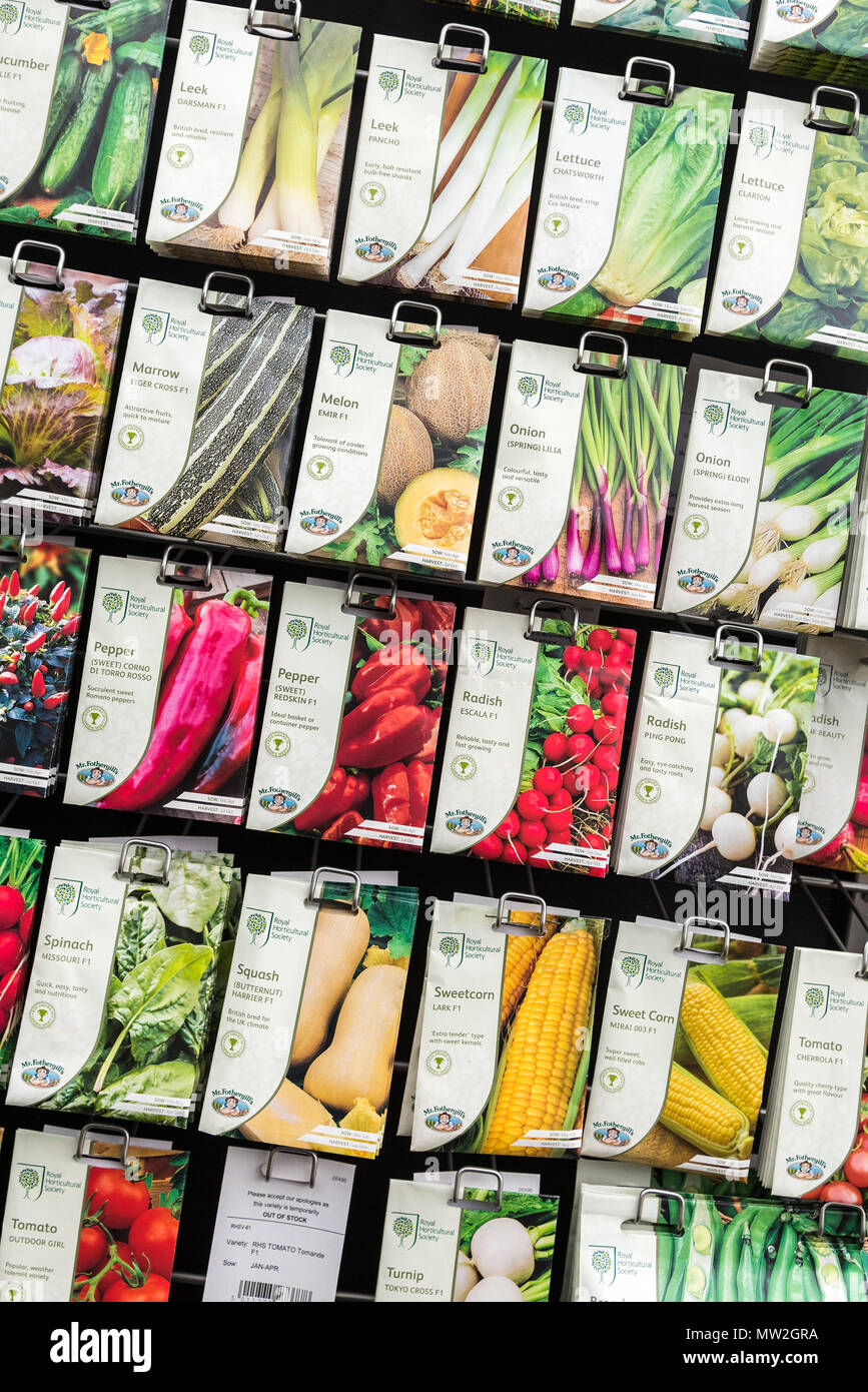 Packets of vegetable seeds on sale in a garden centre. Stock Photo