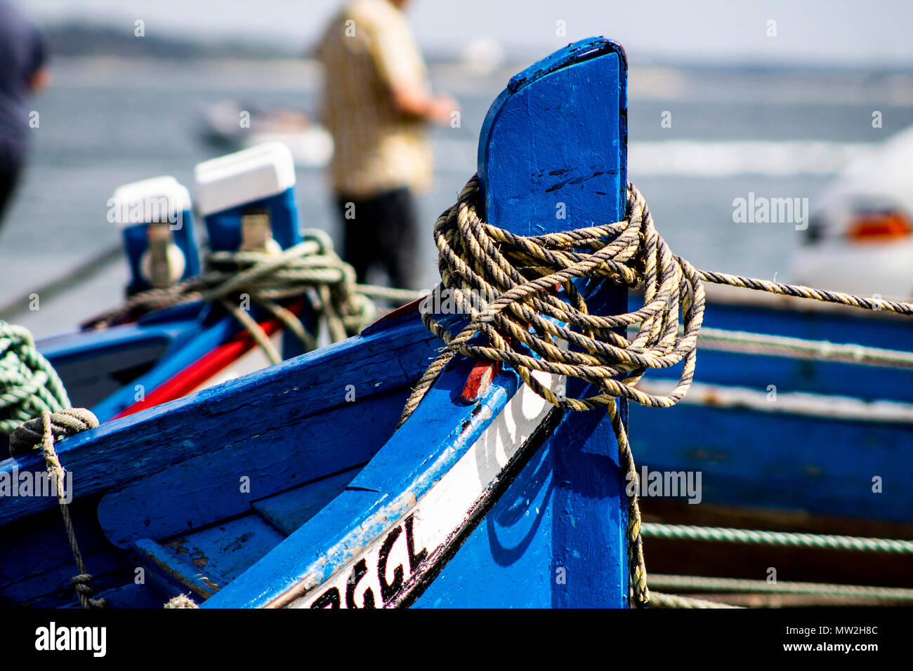 small fishing boats moored in port of many colors Stock Photo Alamy