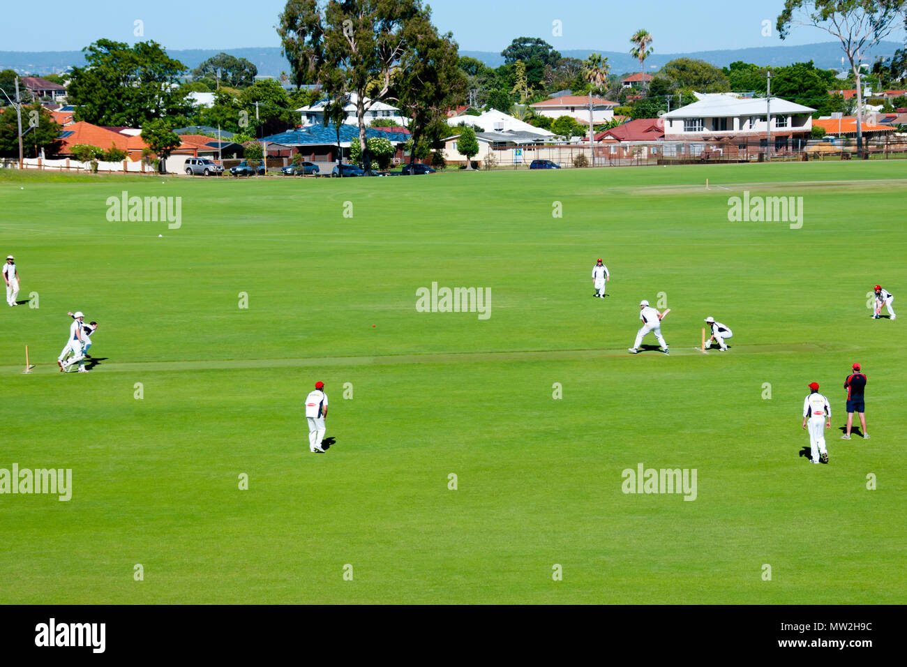 PERTH, AUSTRALIA - February 10, 2018: Outdoors recreational cricket game played in park Stock Photo