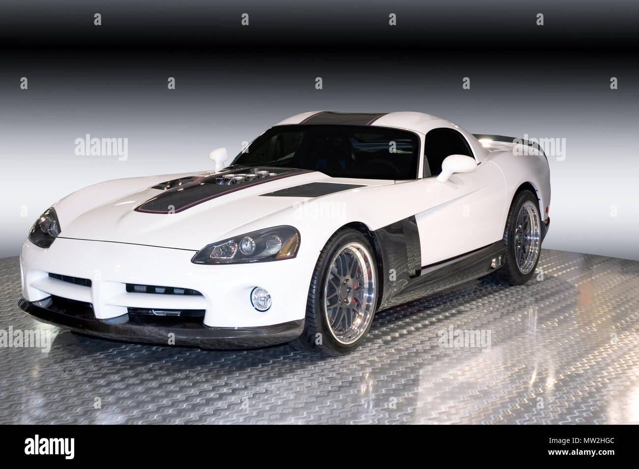 A custom Dodge Viper isolated on a gradient black and white background. Clipping path of background included. Many more car photos inmy gallery. Stock Photo