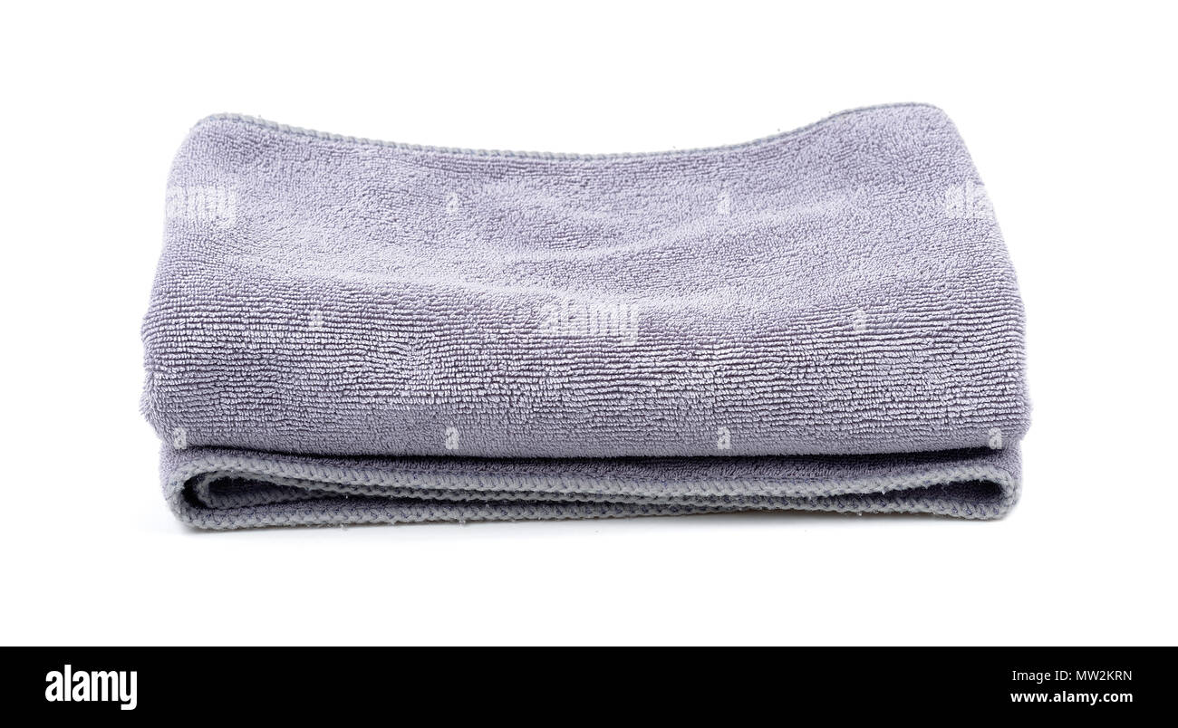 Grey bath towels isolated on white background Stock Photo - Alamy