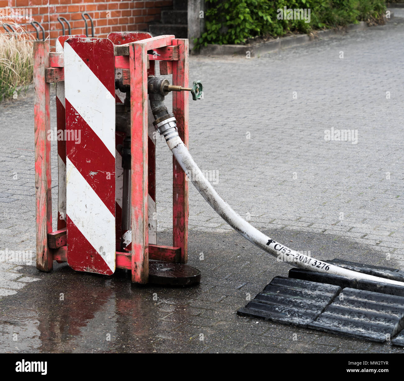 standpipe at a local water connection to supply a construction site with fresh water, Germany Stock Photo