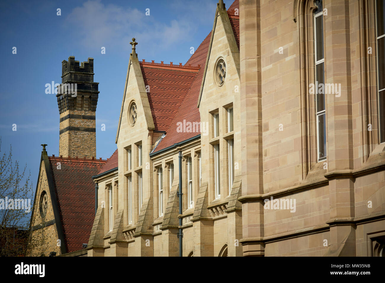 Manchester University Student Services Centre in the Quadrangle traditional older sandstone buildings Stock Photo