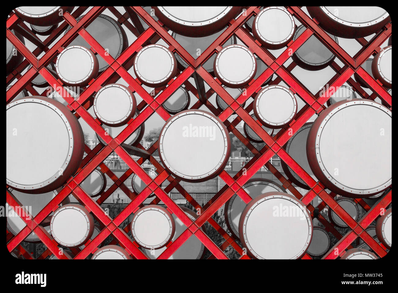 BEIJING, CHINA - MAY 7, 2018: Grid wall with drums inlaid at the man-made sinkage square in the Olympic Forest Park in Beijing Stock Photo