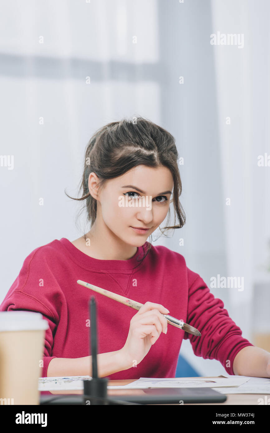 Artist holding brush hi-res stock photography and images - Alamy