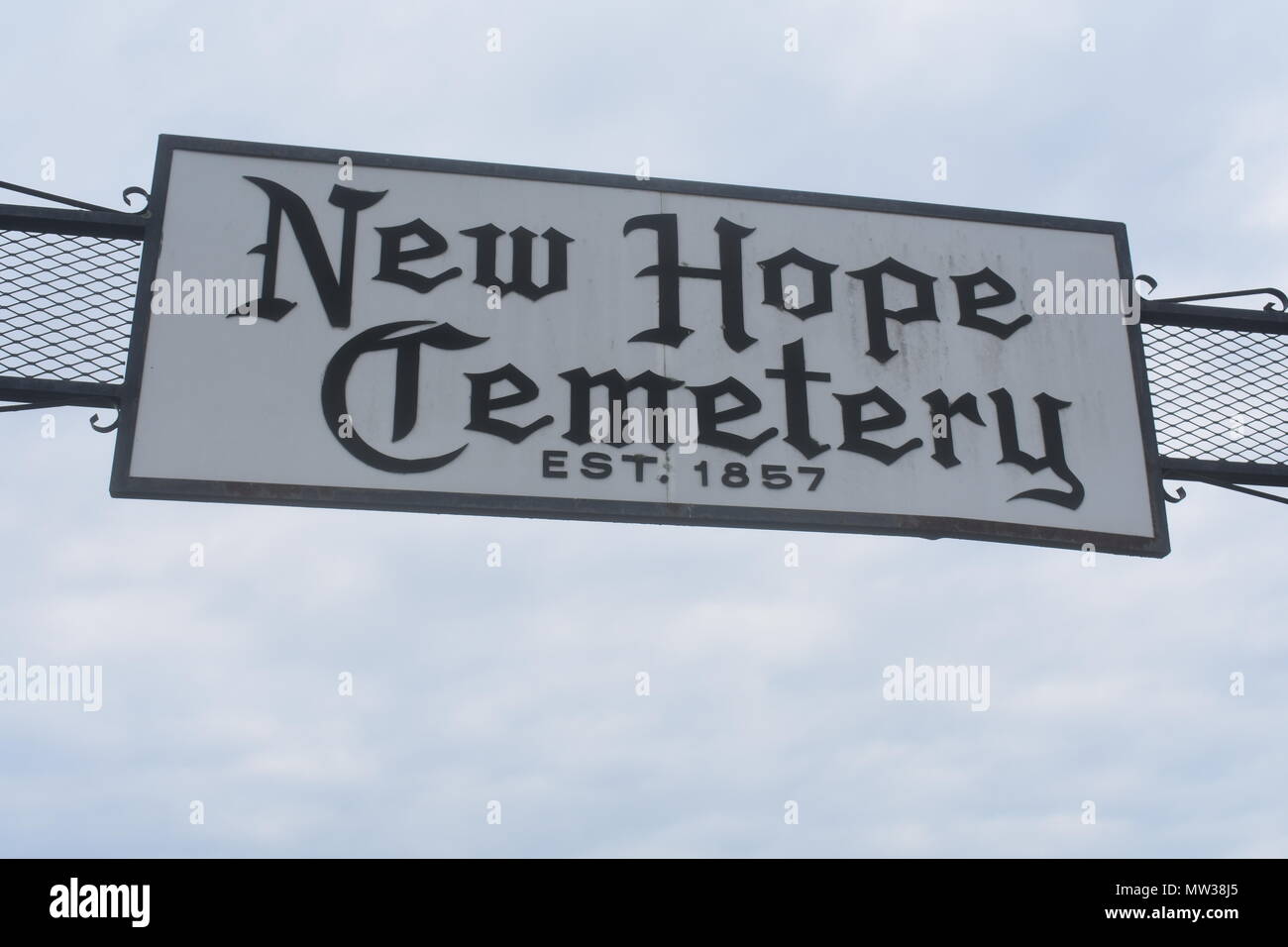 Sign over main entrance to New Hope Cemetery, located in Dallas County, Missouri, MO, United States, US, USA. The cemetery was established in 1857. Stock Photo