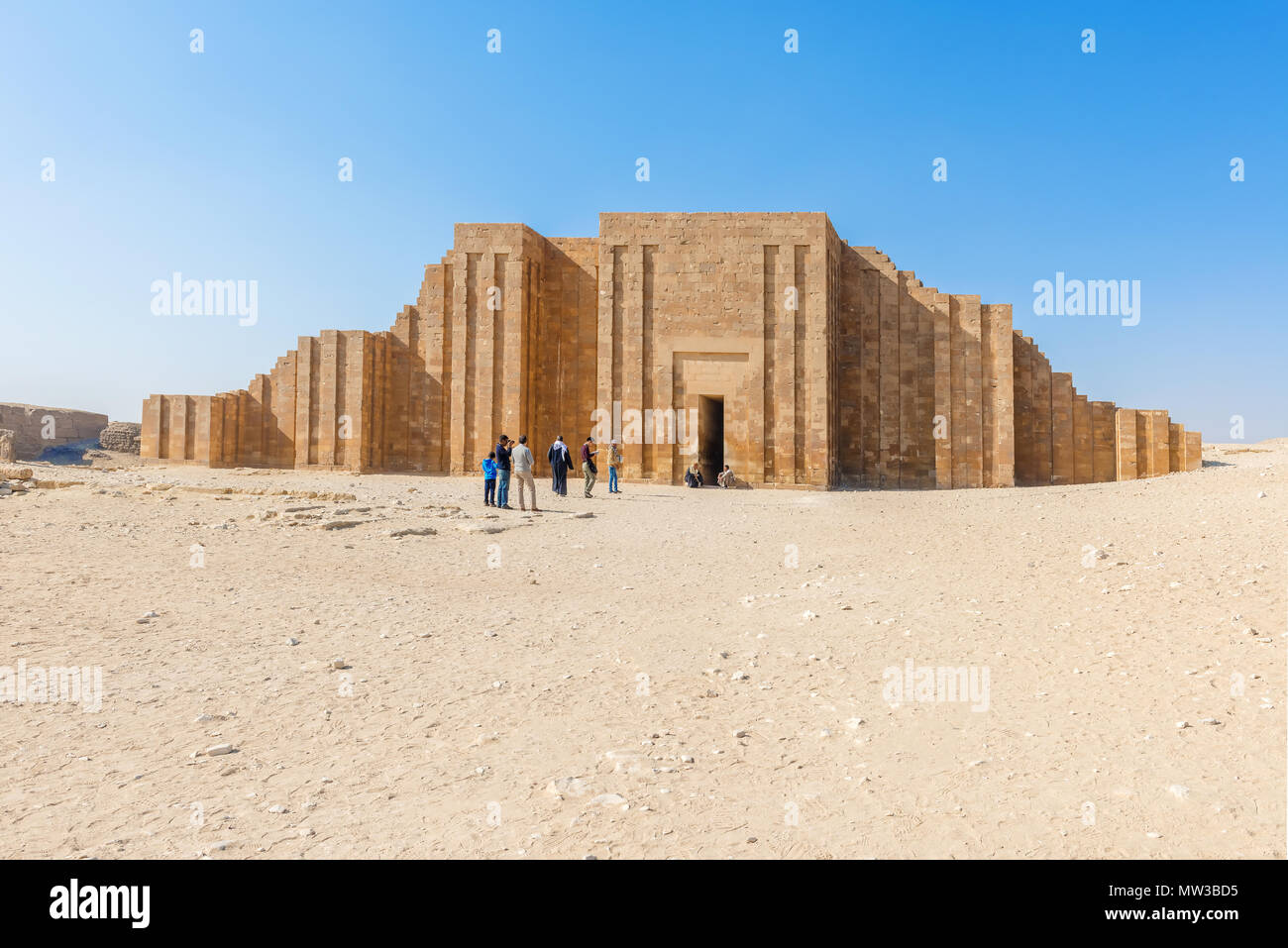 Saqqara, Egypt - December 31, 2014: Tourists in front of  the Saqqara Necropolis, which is a UNESCO World Heritage located near Cairo, Egypt Stock Photo