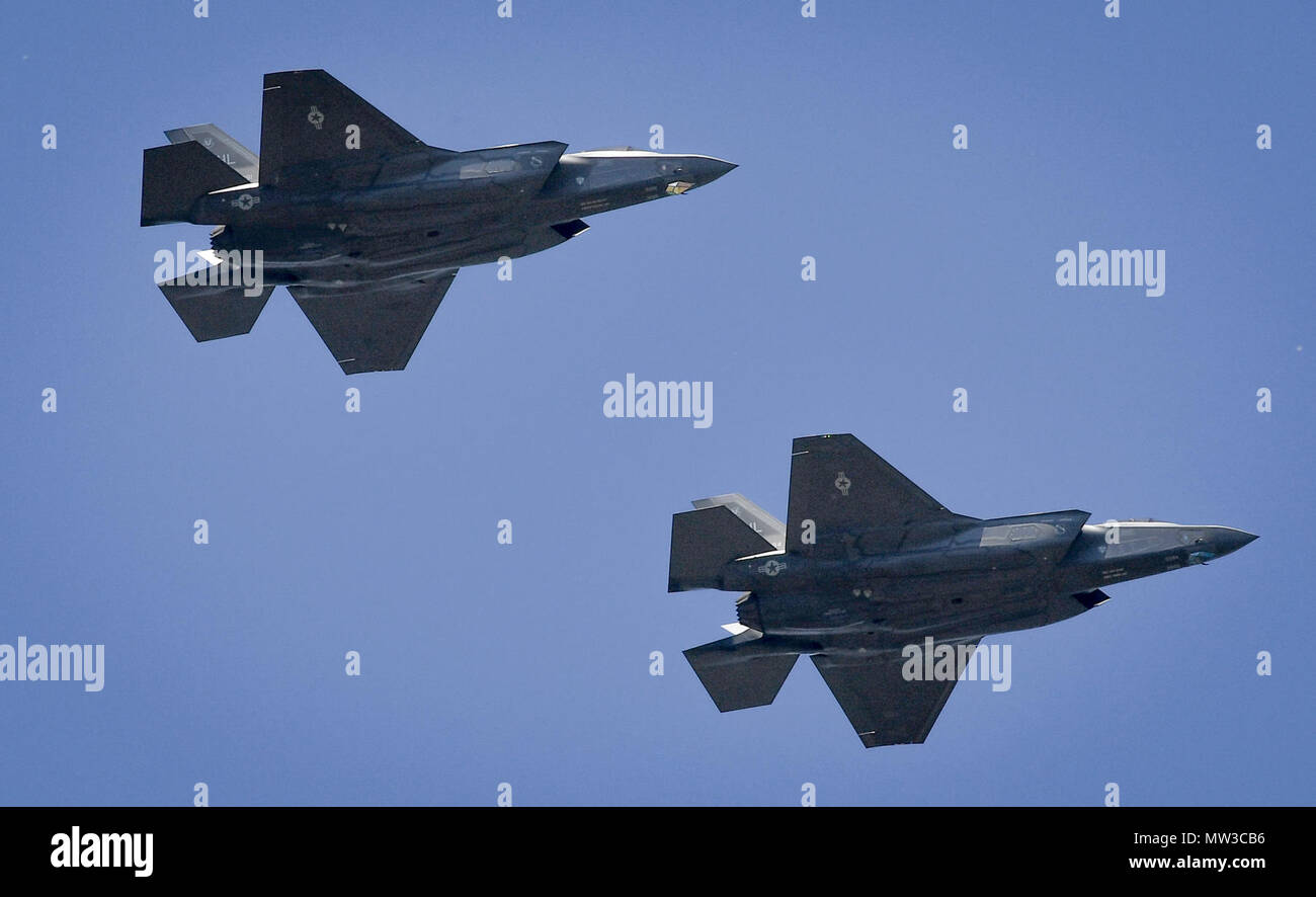 Two U.S. Air Force F-35A Lightning II aircraft flies by a crowd at Graf Ignatievo Air Base, Bulgaria, April 28, 2017, marking the first time the NATO country has hosted the 5th generation fighter aircraft. Eight F-35s deployed from Hill Air Force Base, Utah to RAF Lakenheath, England on April 15. Two of the eight forward deployed to Bulgaria for a brief time which allowed the F-35s to engage in familiarization training within the European theater while reassuring allies and partners of U.S. dedication to the enduring peace and stability of the region. The F-35s are assigned to the 34th Fighter Stock Photo