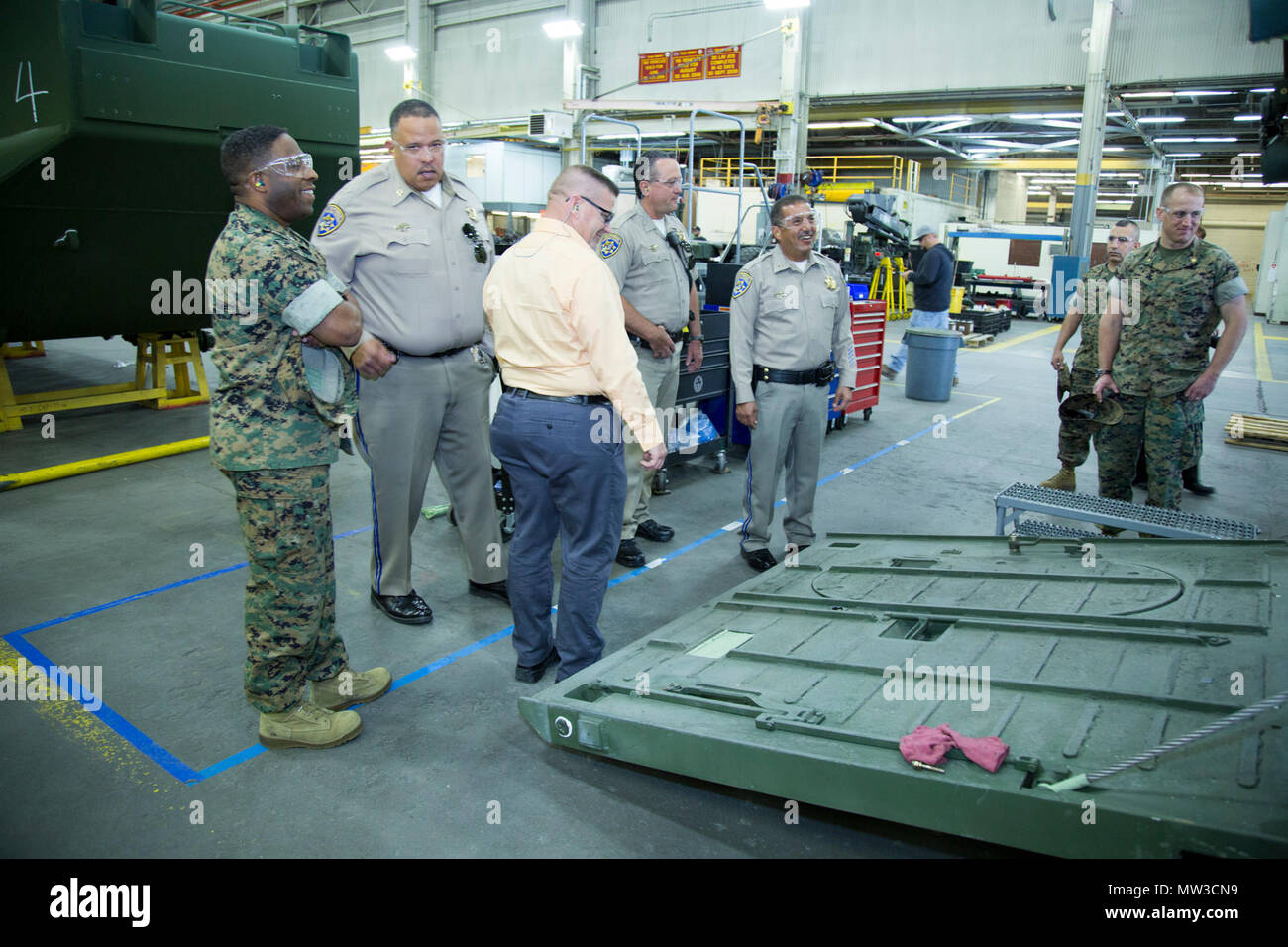(Left) Colonel Sekou Karega, commanding officer, Marine Corps Logistics