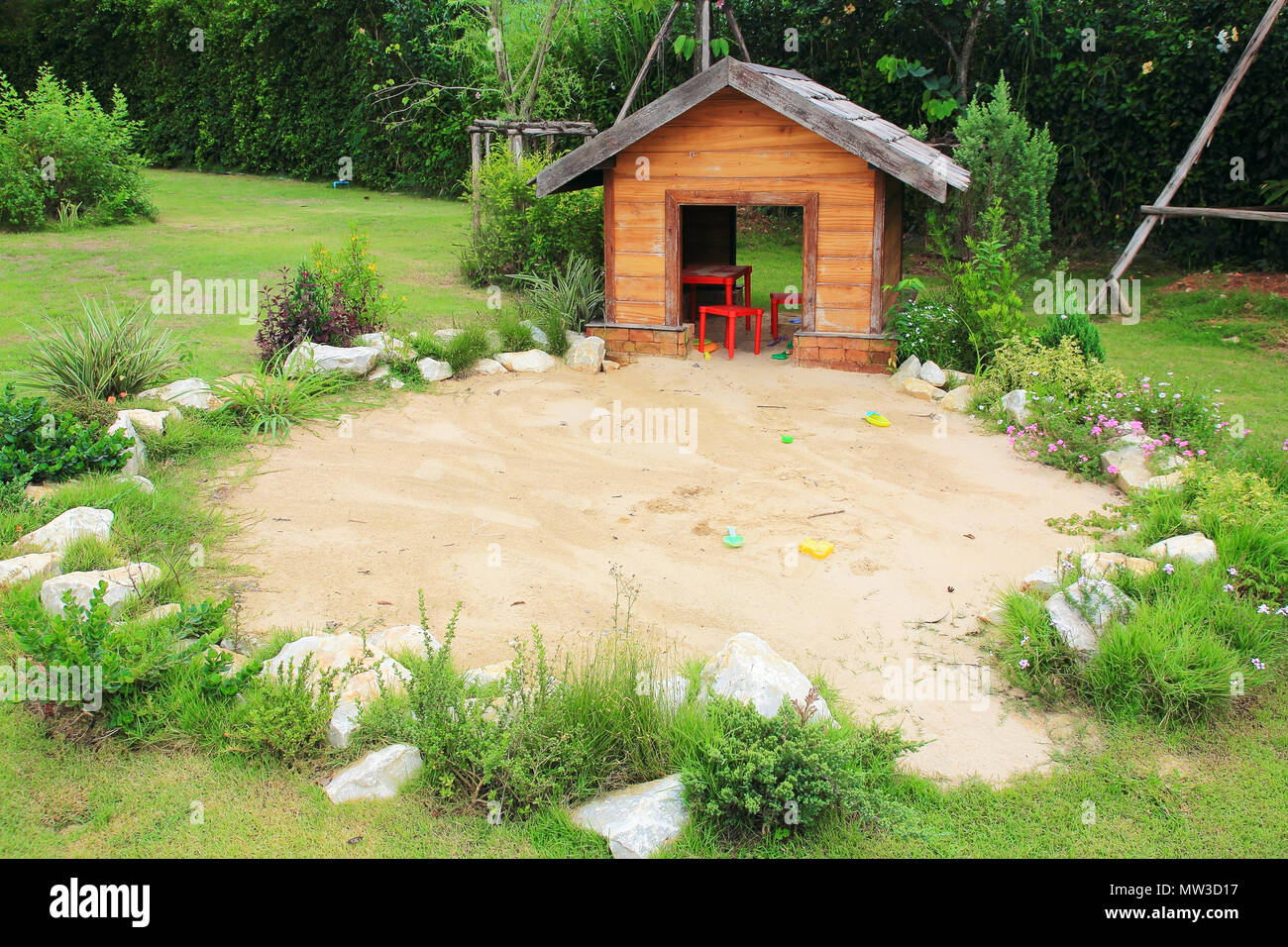 Playground sandbox outdoor in garden Stock Photo Alamy