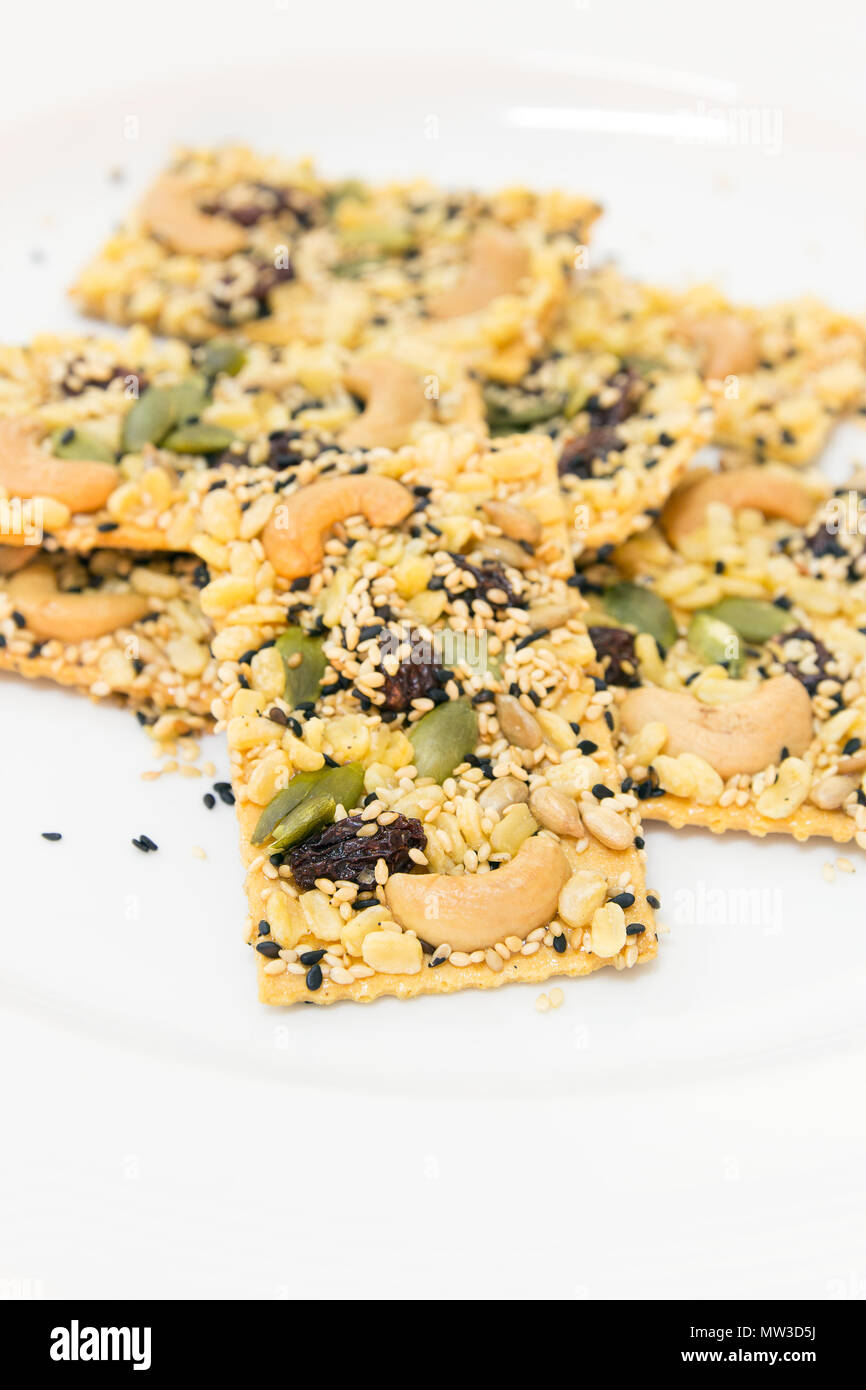 Cereal cracker on white dish Stock Photo