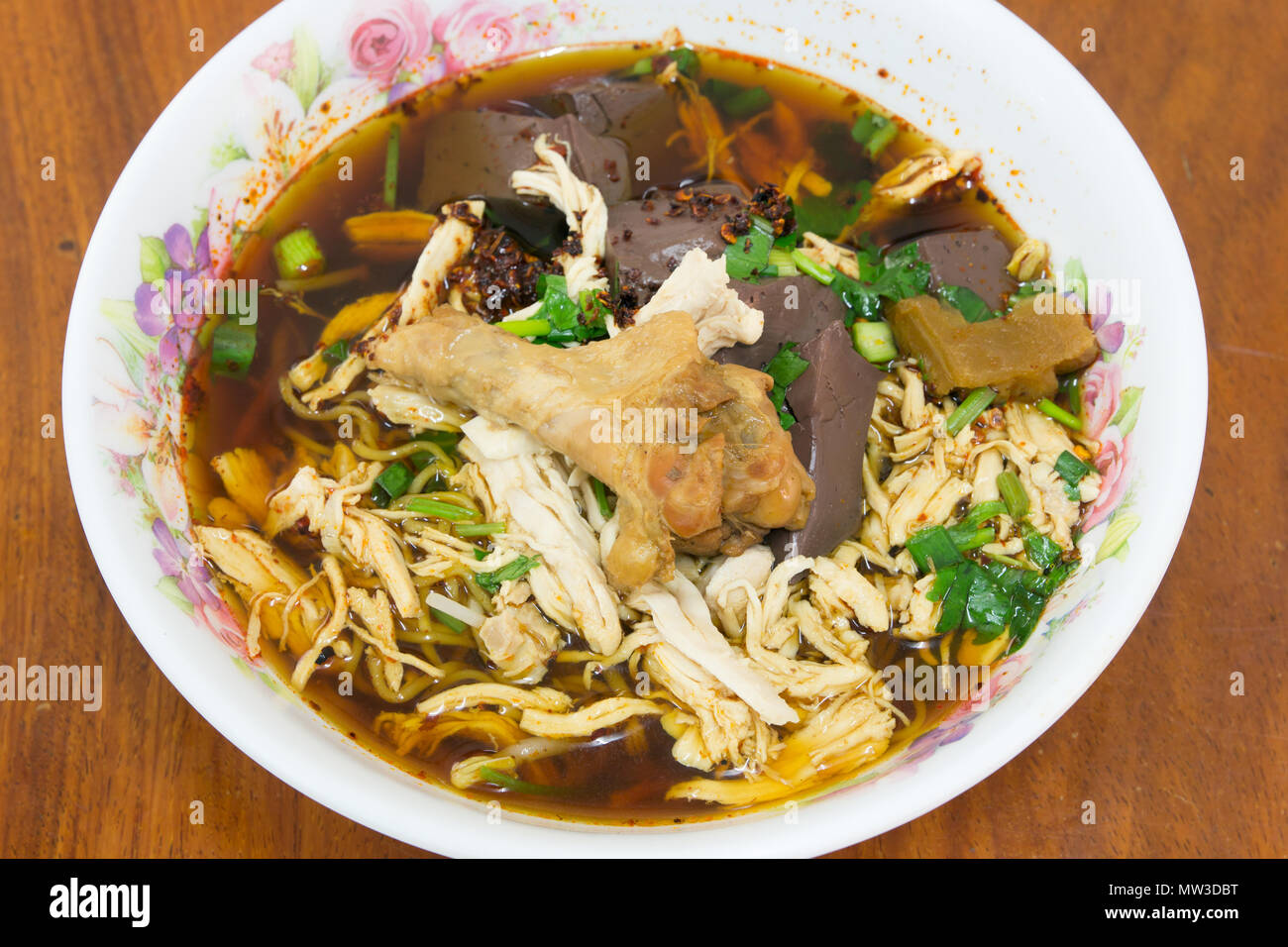 Braised chicken noodle soup thai style Stock Photo - Alamy