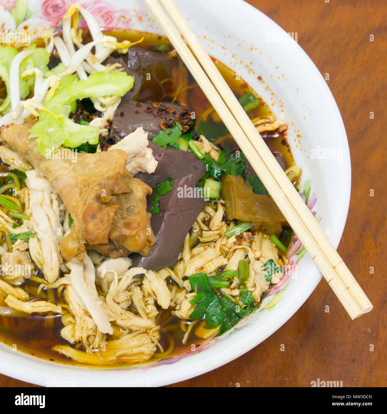 Braised chicken noodle soup thai style Stock Photo - Alamy