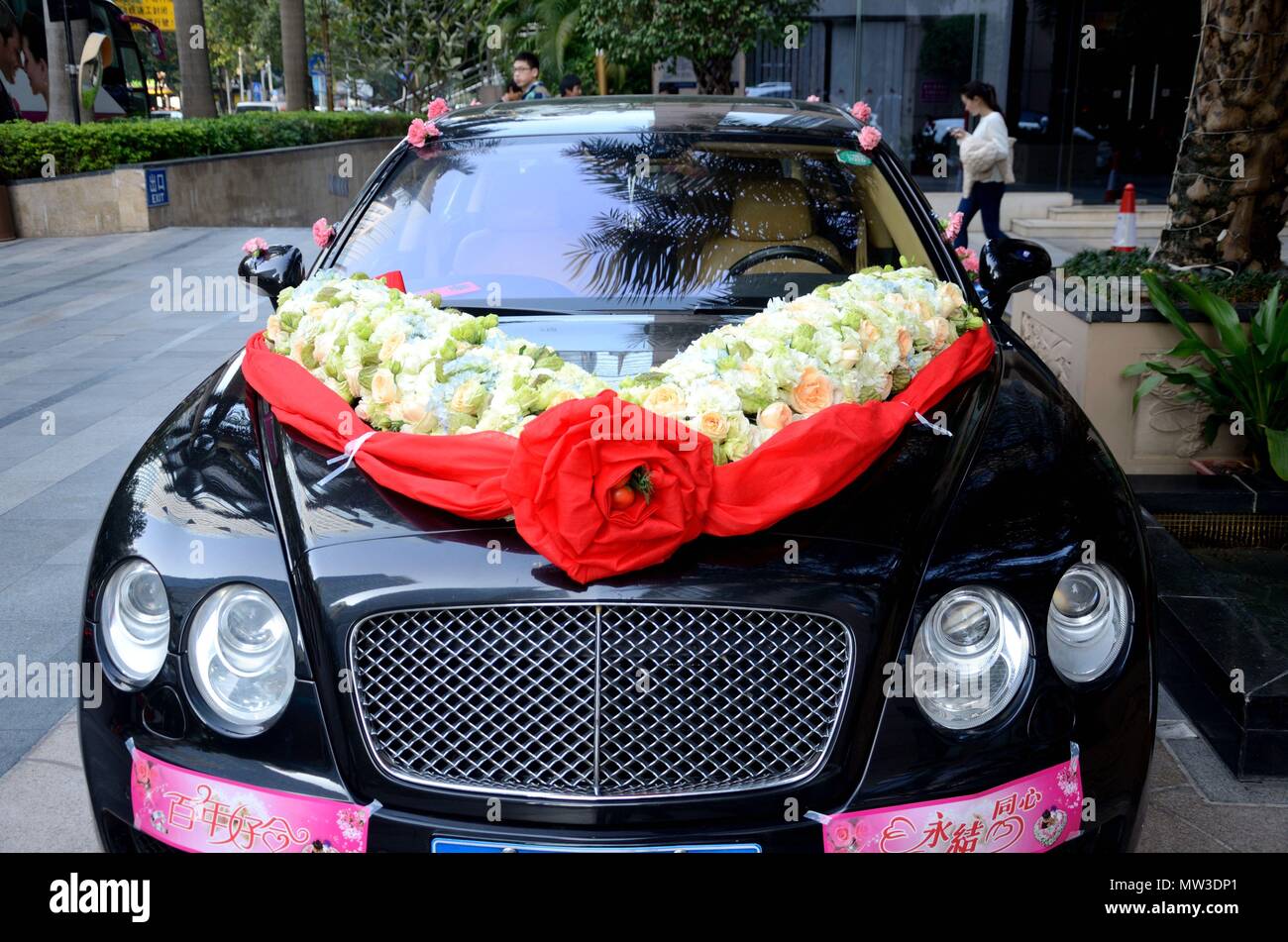 SHENZHEN, CHINA - APRIL 3: luxury limousin in front of Marco Polo hotel,  car prepared for wedding on April 3rd, 2018 Stock Photo - Alamy