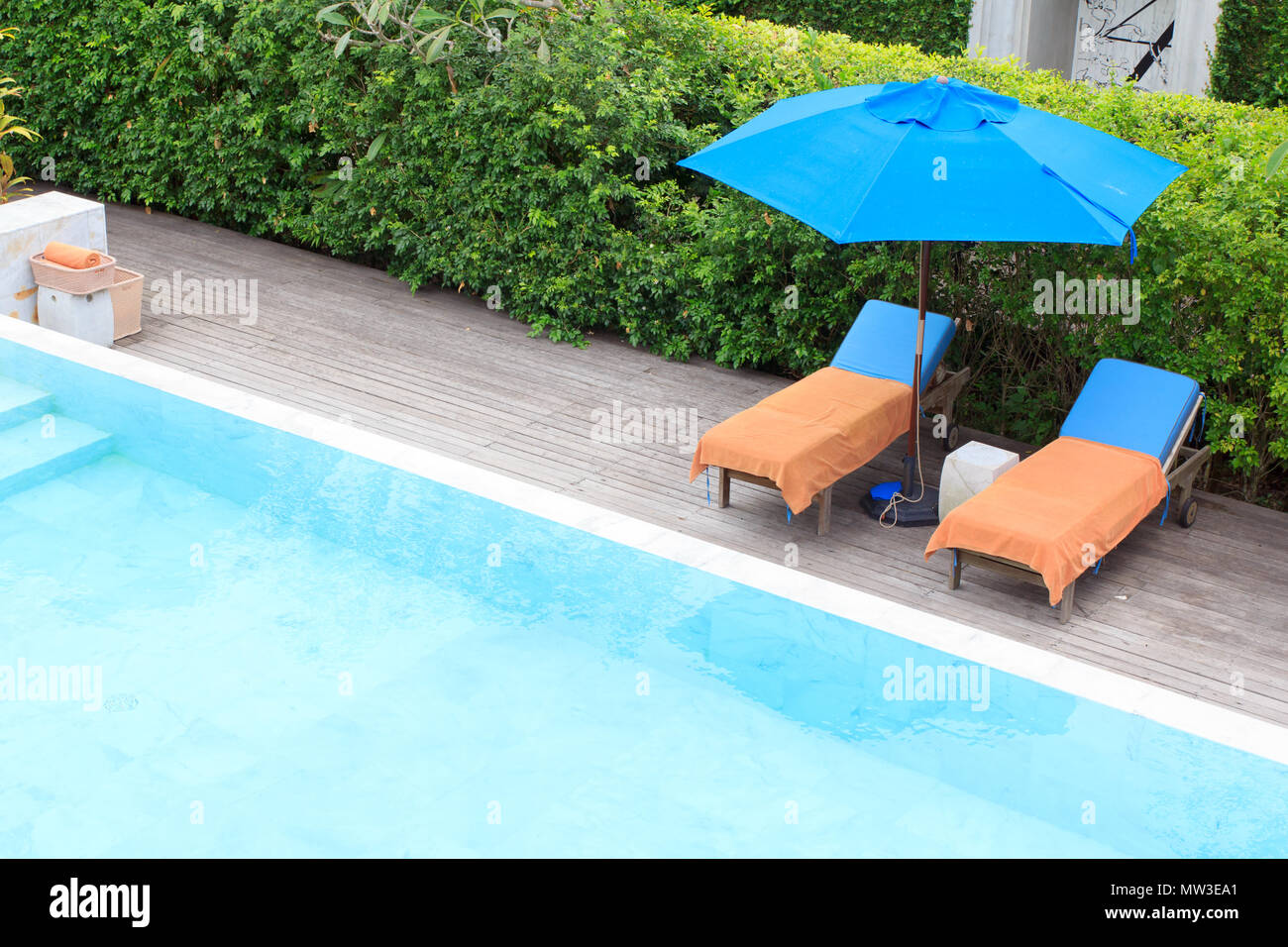 Swimming pool deck chair towel hires stock photography and images Alamy