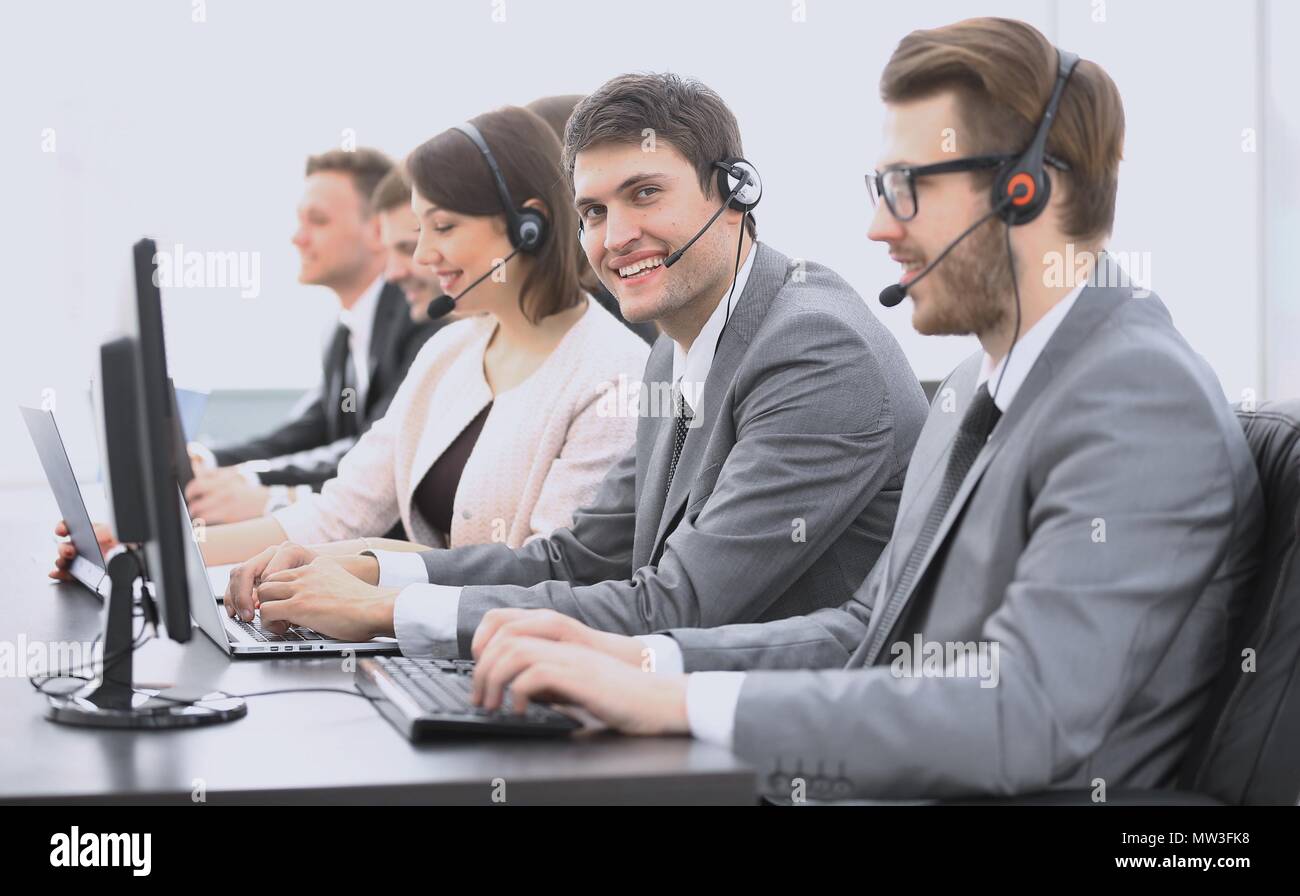 Employee call center with headset at workplace stock photo alamy