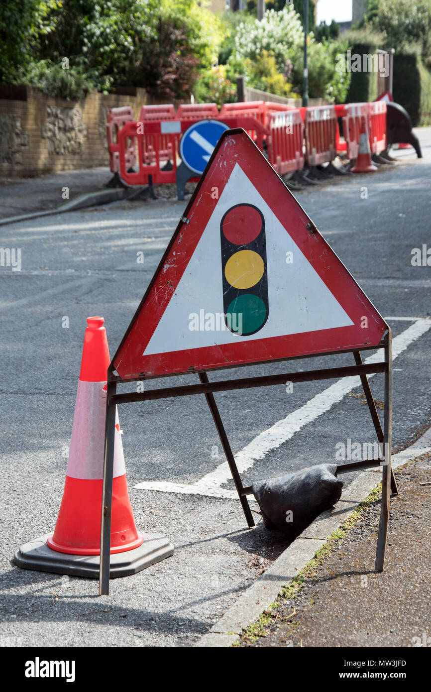 Road sign in UK traffic lights Stock Photo