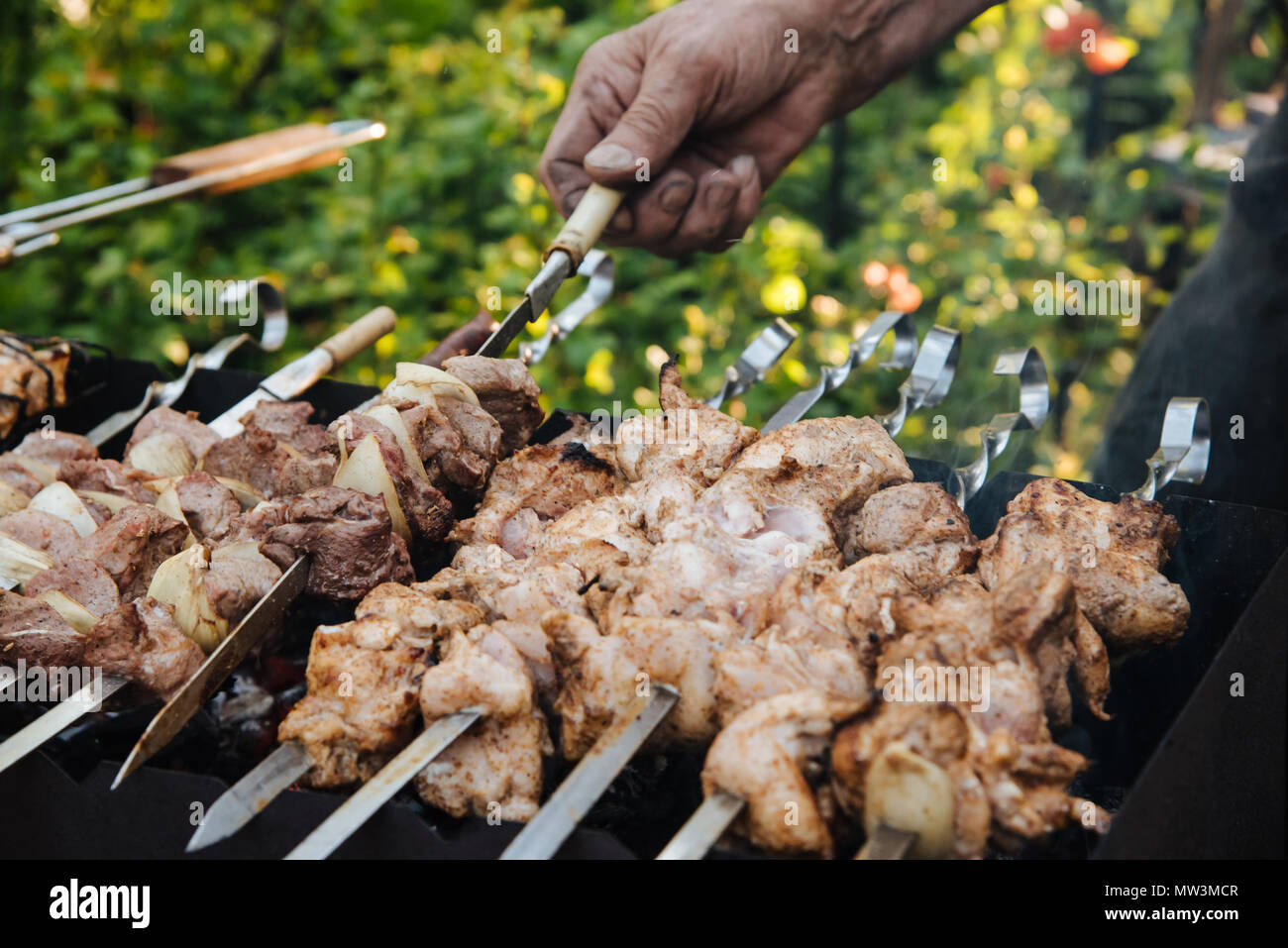 Outdoor barbecue in summer evening close up Stock Photo - Alamy