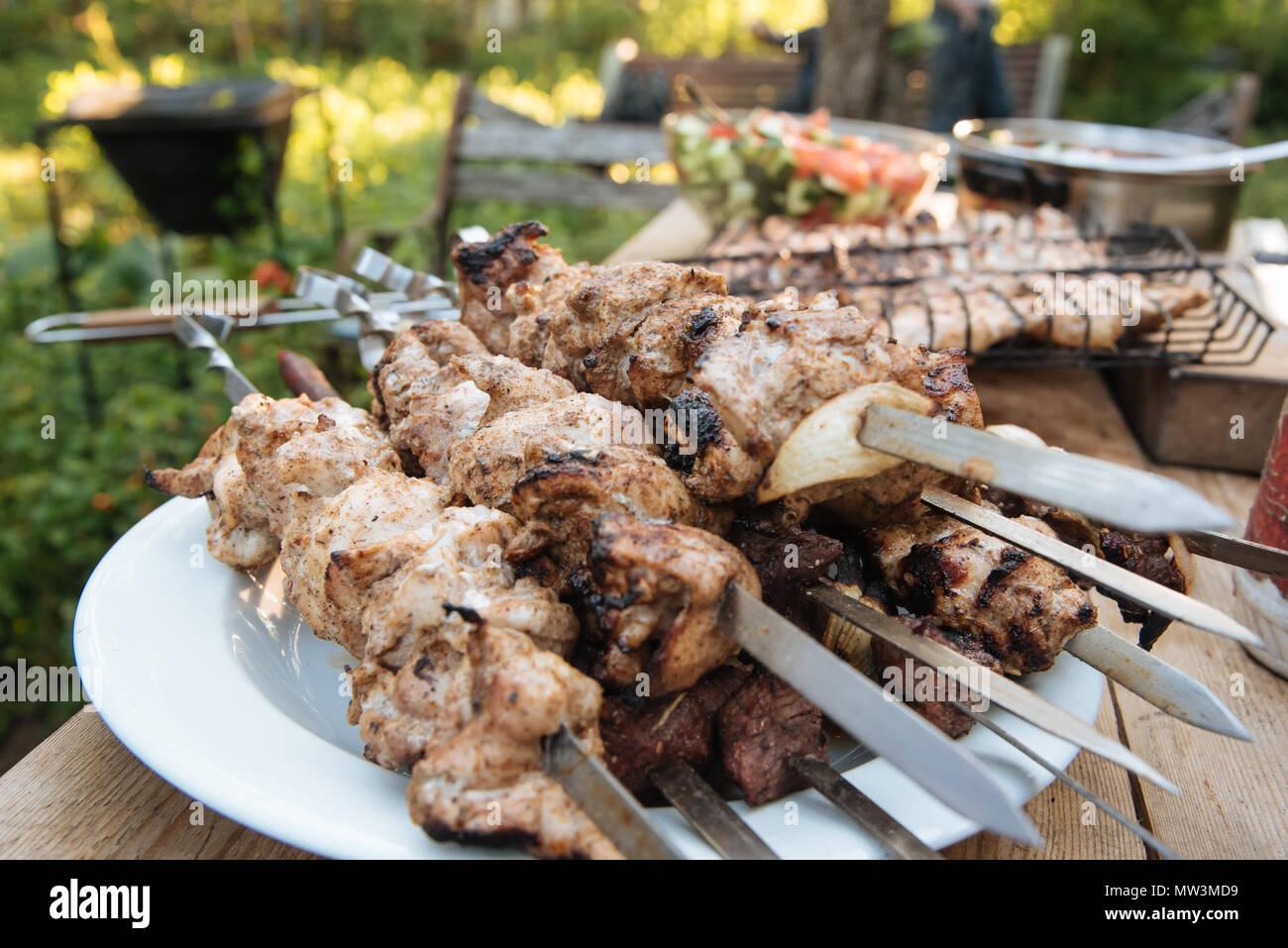 Outdoor barbecue in summer evening close up Stock Photo - Alamy