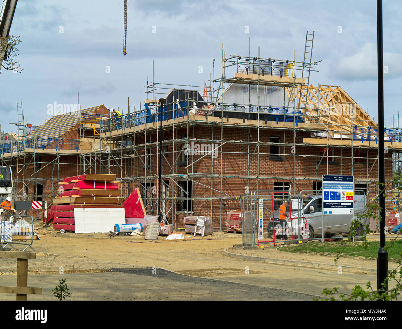 New house covered in scaffolding at a new housing development on the ...