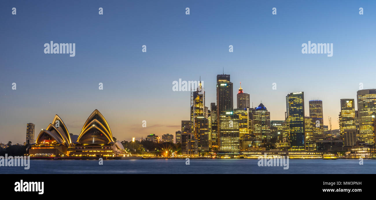 Sydney Opera House  with the Skyline at sunset Stock Photo