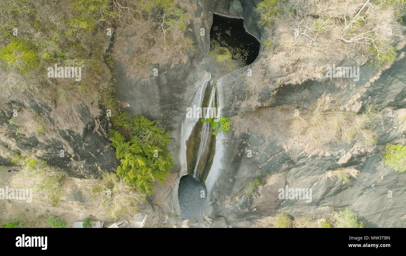 Aerial view of waterfall in the mountains of Filipino cordillera