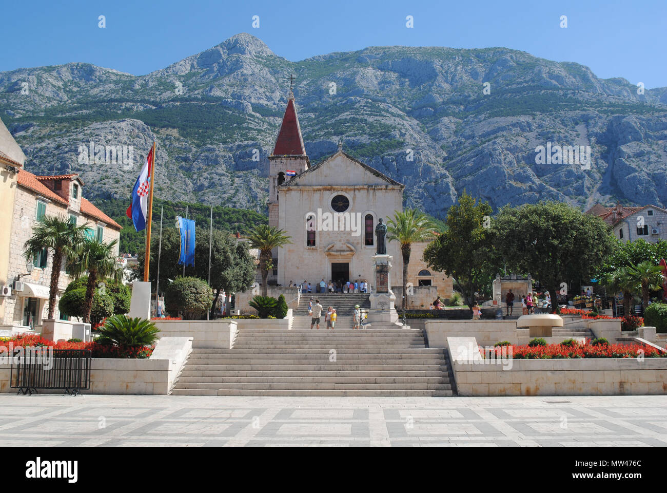 The church of St. Mark with the Biokovo mountain range in the background. Stock Photo