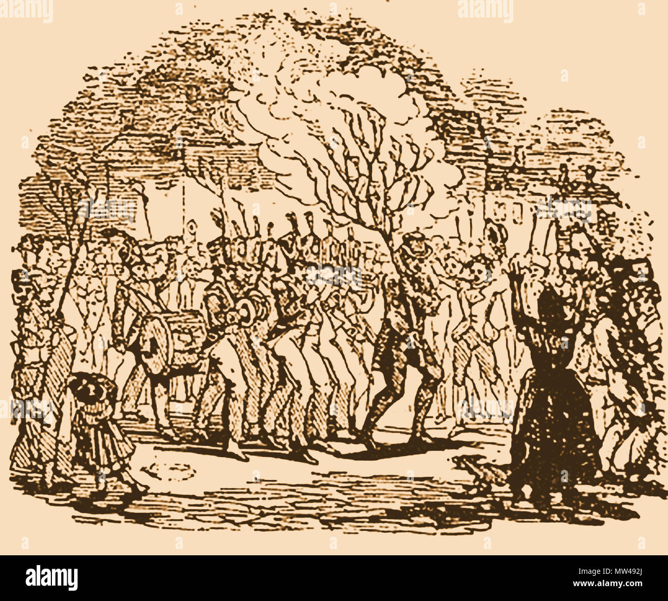 Twelfth Night (old Christmas Day) ceremony  at Brough, Eden in Westmoreland (Cumbria)  and probably once common elsewhere in  Britain- carrying the burning holly bush Stock Photo