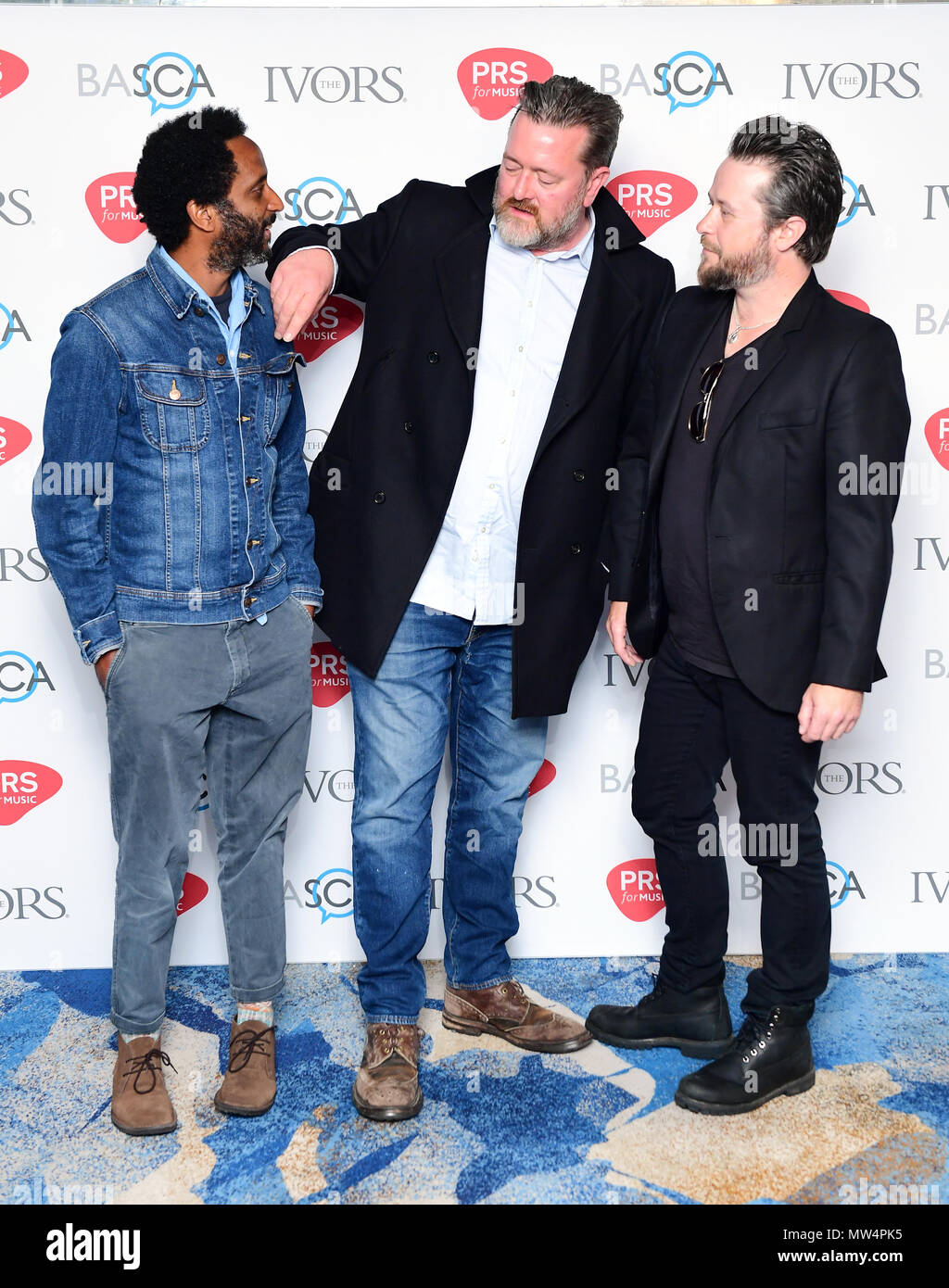 (leftright) Pete Turner, Guy Carvey and Mark Potter of Elbow during