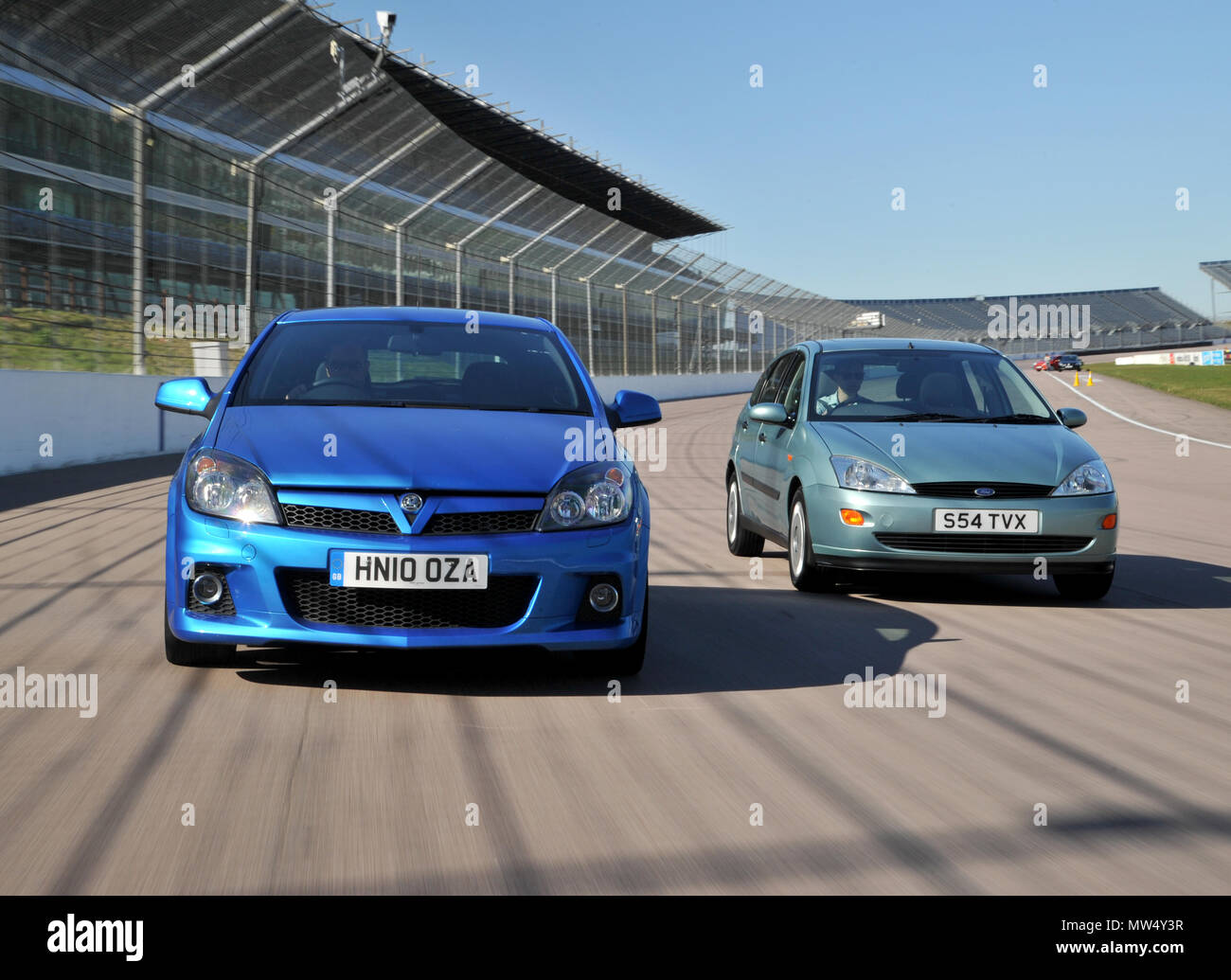 1998 Mk1 Ford Fiesta and 2010 mk5 Vauxhall Astra British hatchback cars Stock Photo