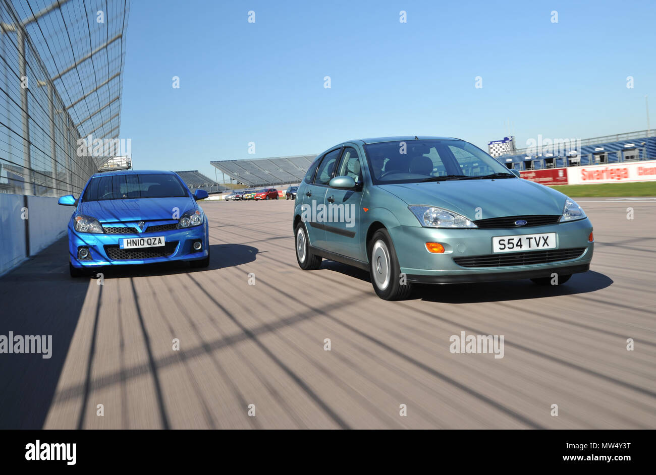 1998 Mk1 Ford Fiesta and 2010 mk5 Vauxhall Astra British hatchback cars Stock Photo